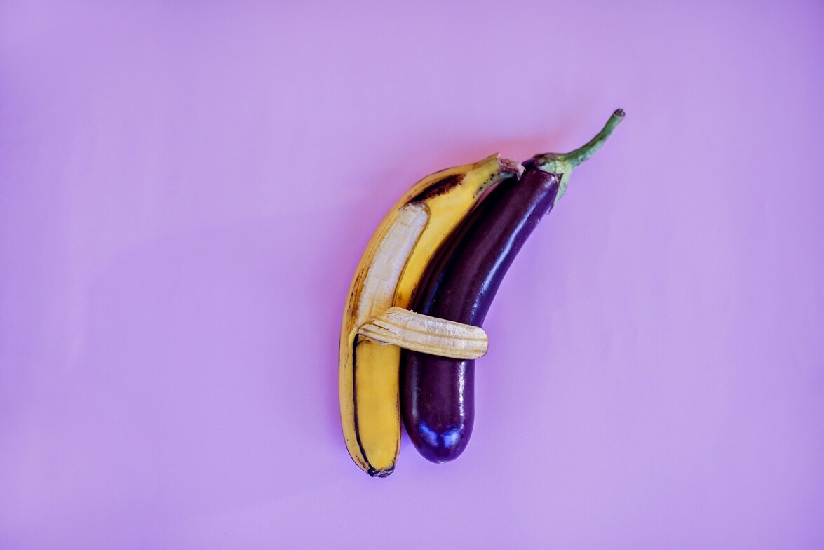 banana holding an eggplant amorously
